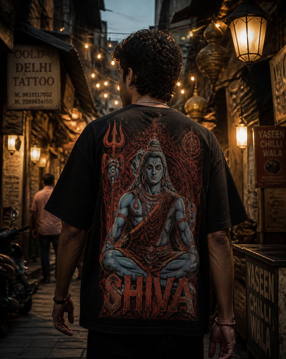 Model wearing the Shiva tee in an old Delhi lantern-lit alley